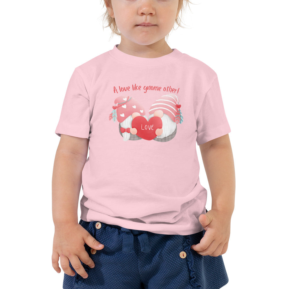 Upgrade your little one's style with our Cute and Cozy Gnome Love Toddler T-Shirt - Short Sleeve from Raining Gifts Design. Charming gnome design and comfortable fit